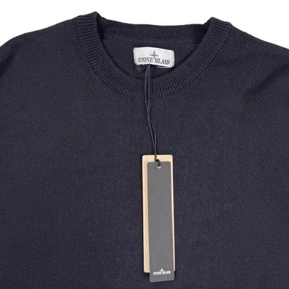 Stone Island black knit jumper with logo patch and organic cotton material.