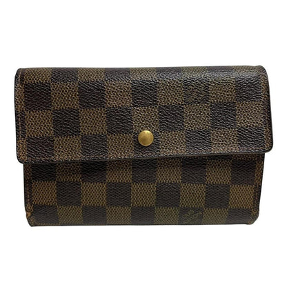 Louis Vuitton gold crossbody wallet Damier Ebene canvas with removable strap and logo.
