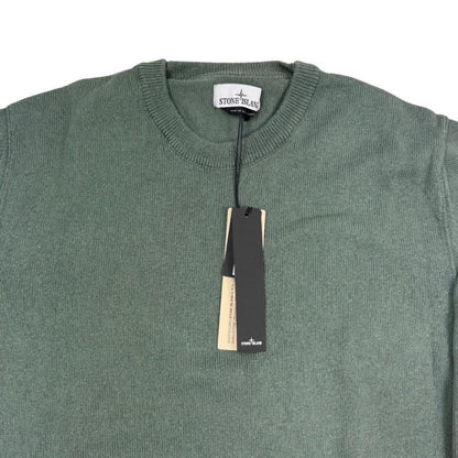 Stone Island green knit jumper made from organic cotton with logo patch detail.
