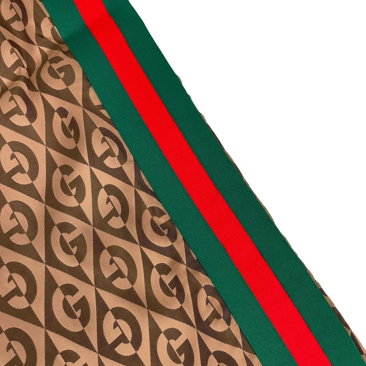 Gucci brown trousers with G rhombus jacquard pattern and soft viscose material.