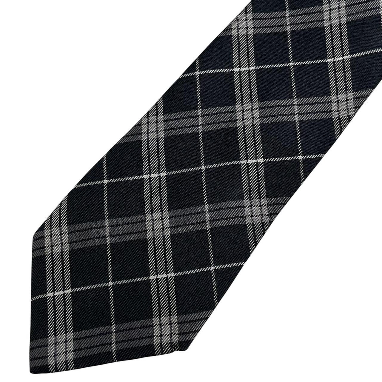 Banana Republic silk tie black and white check pattern with a smooth finish.