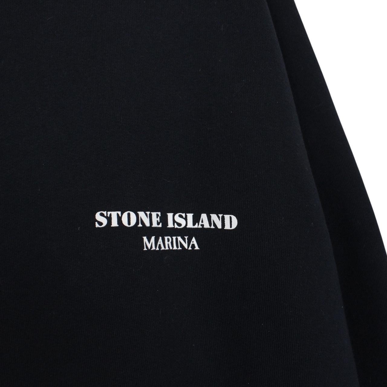 Stone Island beige and navy blue cotton hoodie with logo patch and drawstring hood.