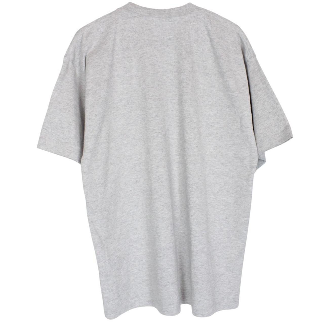 Nike grey short sleeve cotton t-shirt with pocket and vintage logo detail.