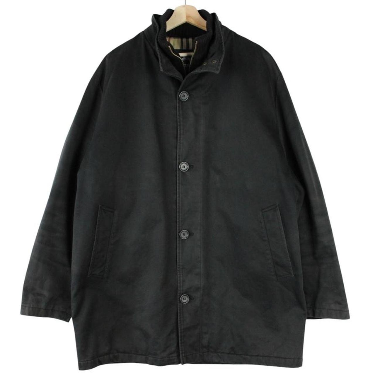 Burberry black coat with Nova Check lining and full zip closure, vintage style.