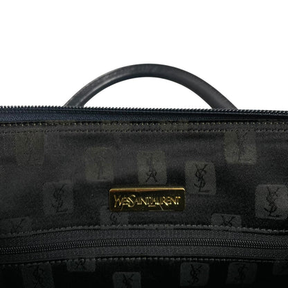 Yves Saint Laurent navy blue duffel bag embossed logo nylon material with handles.