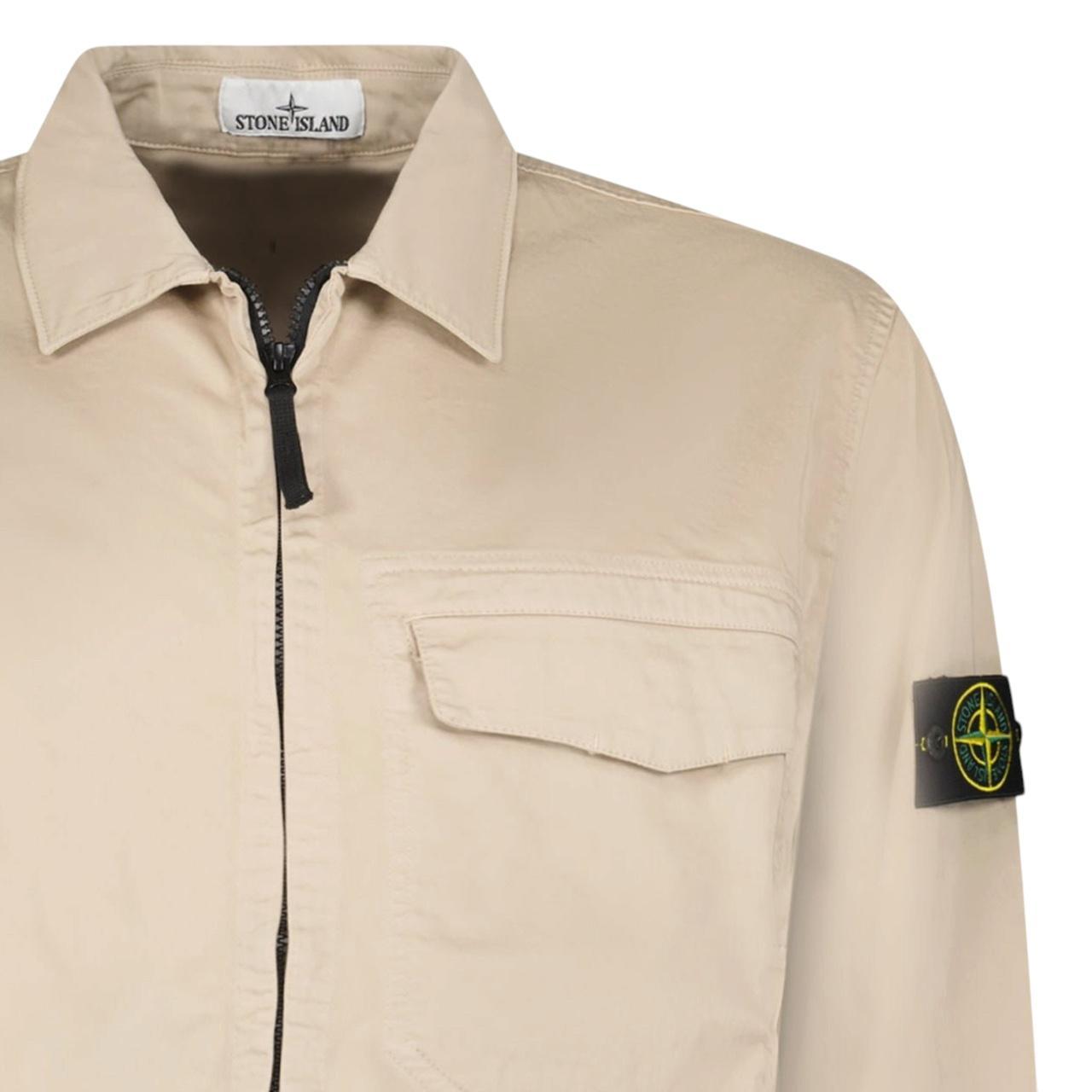 Stone Island beige overshirt jacket with buttoned chest pocket and concealed zipper.