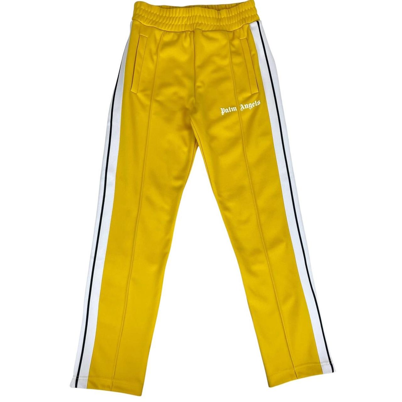 Palm Angels white and yellow joggers with logo detailing and classic fit.