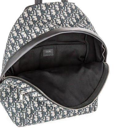 Dior beige and black oblique jacquard monogram rider backpack with logo pattern.