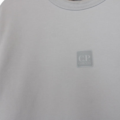 CP Company grey cotton sweatshirt with logo patch and ribbed cuffs.