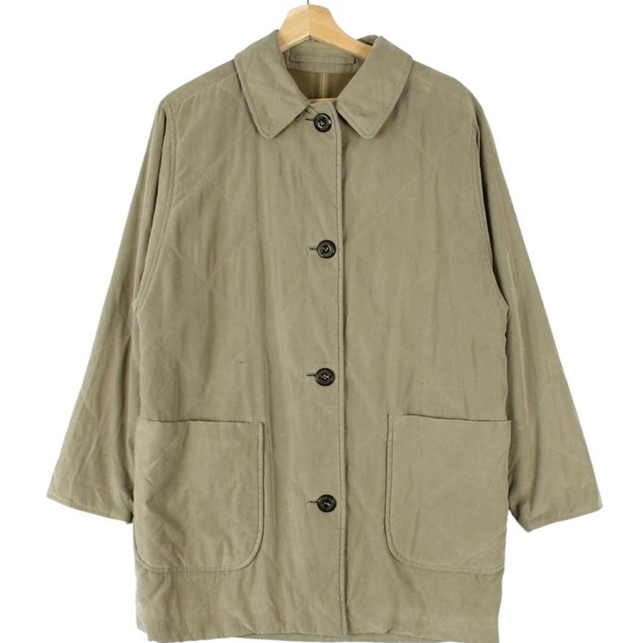 Burberry khaki green quilted coat with wool lining and classic logo detail.