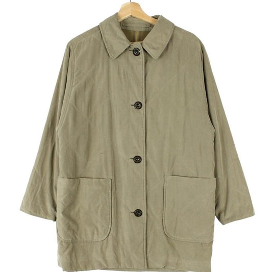 Burberry khaki green quilted coat with wool lining and classic logo detail.