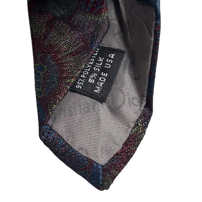 Christian Dior multicoloured tie featuring intricate patterns in silk and polyester.