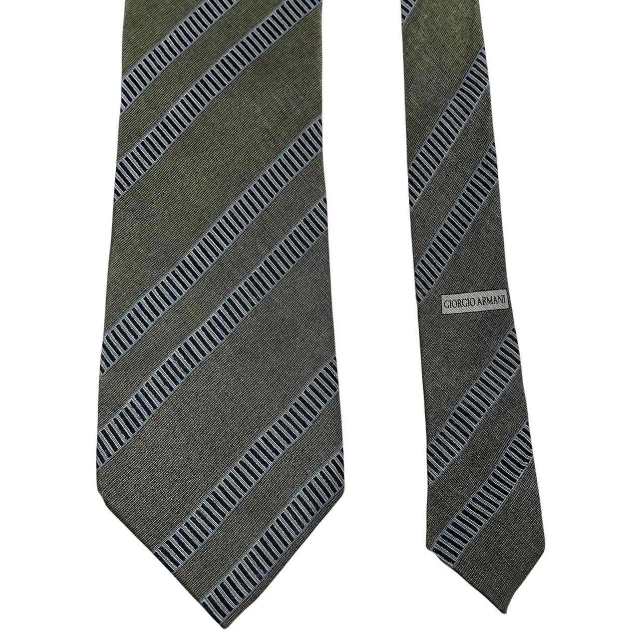 Armani green linen/silk blend tie with subtle sheen and elegant texture.