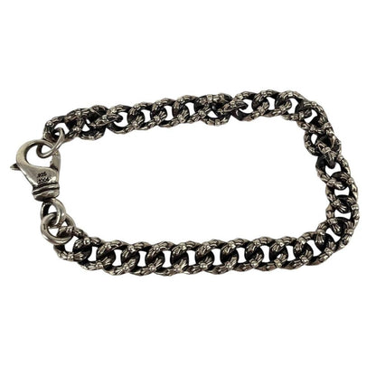 Chrome Hearts silver bracelet with intricate link design and logo detailing.