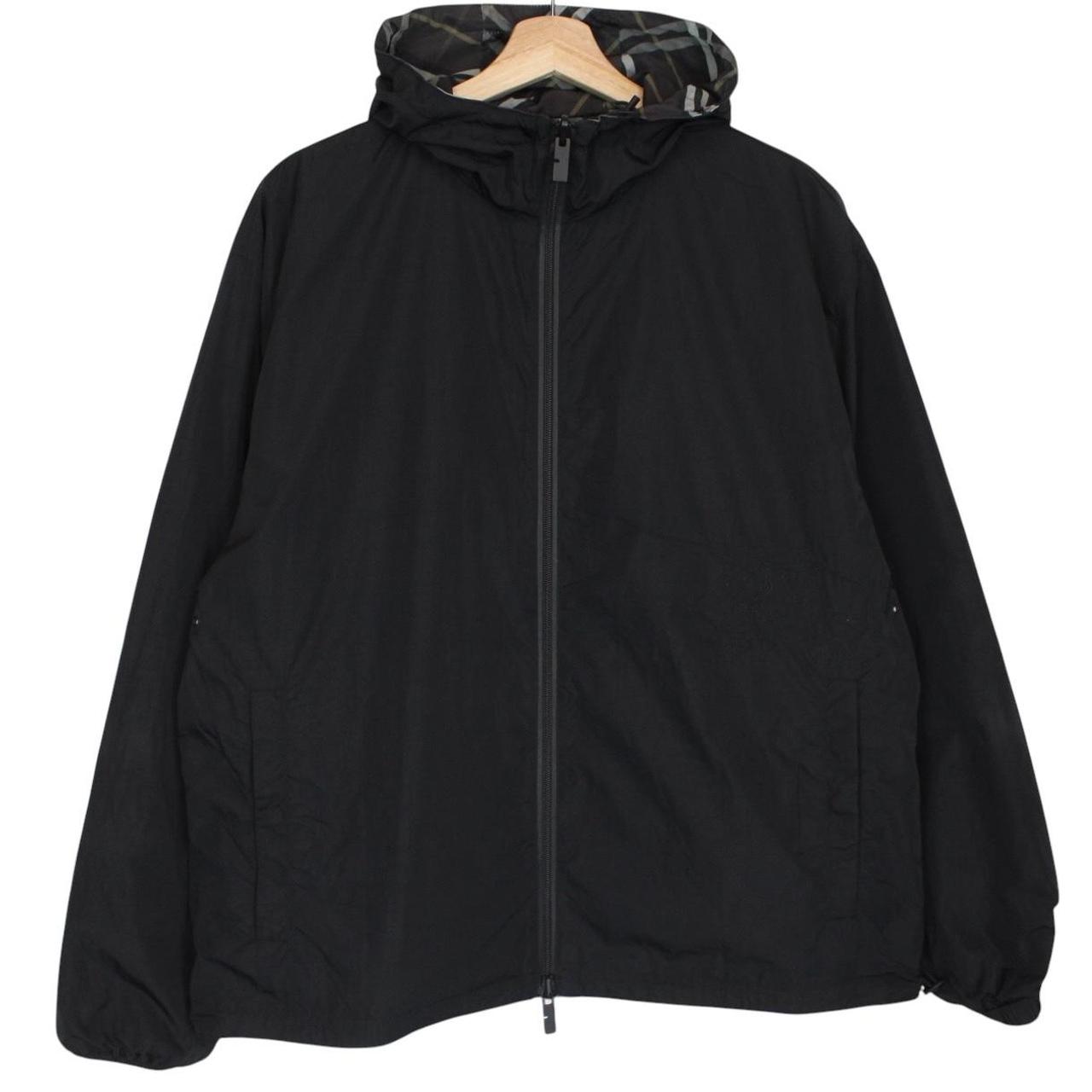 Burberry reversible jacket in dark grey and black with Nova Check pattern and full zip.