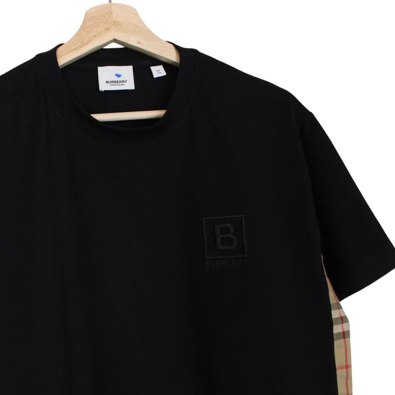 Burberry beige and black short sleeve t-shirt with Nova Check pattern and logo.
