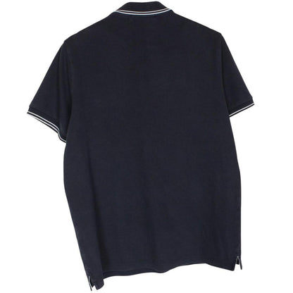 Stone Island navy blue short sleeve polo shirt with compass logo and cotton material.