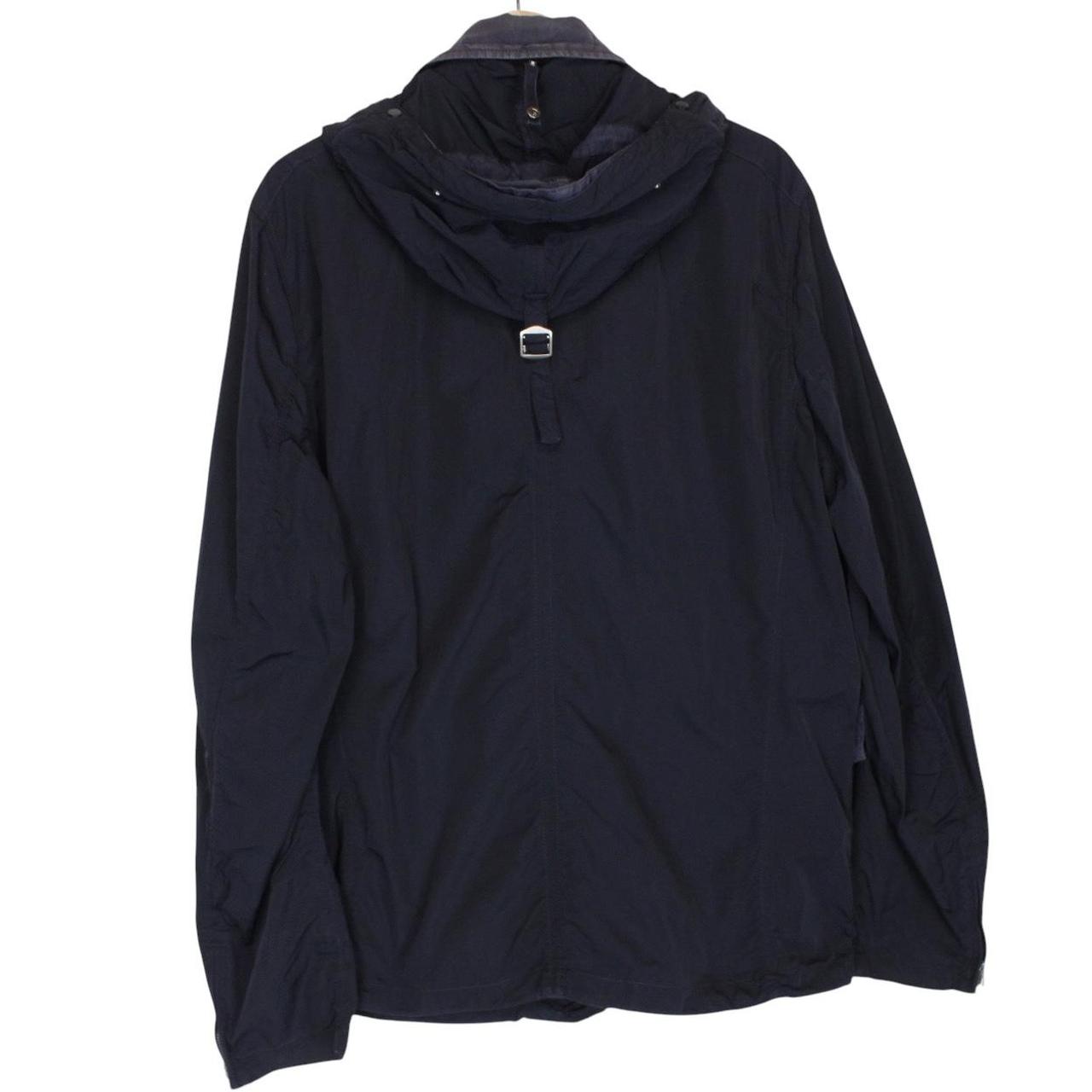 CP Company navy blue nylon jacket with multi pockets and garment dyed finish.