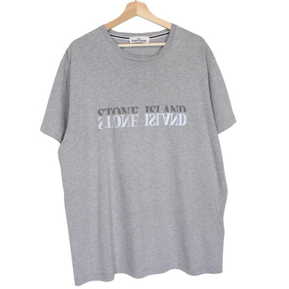 Stone Island grey short sleeve t-shirt with reflective logo and cotton material.