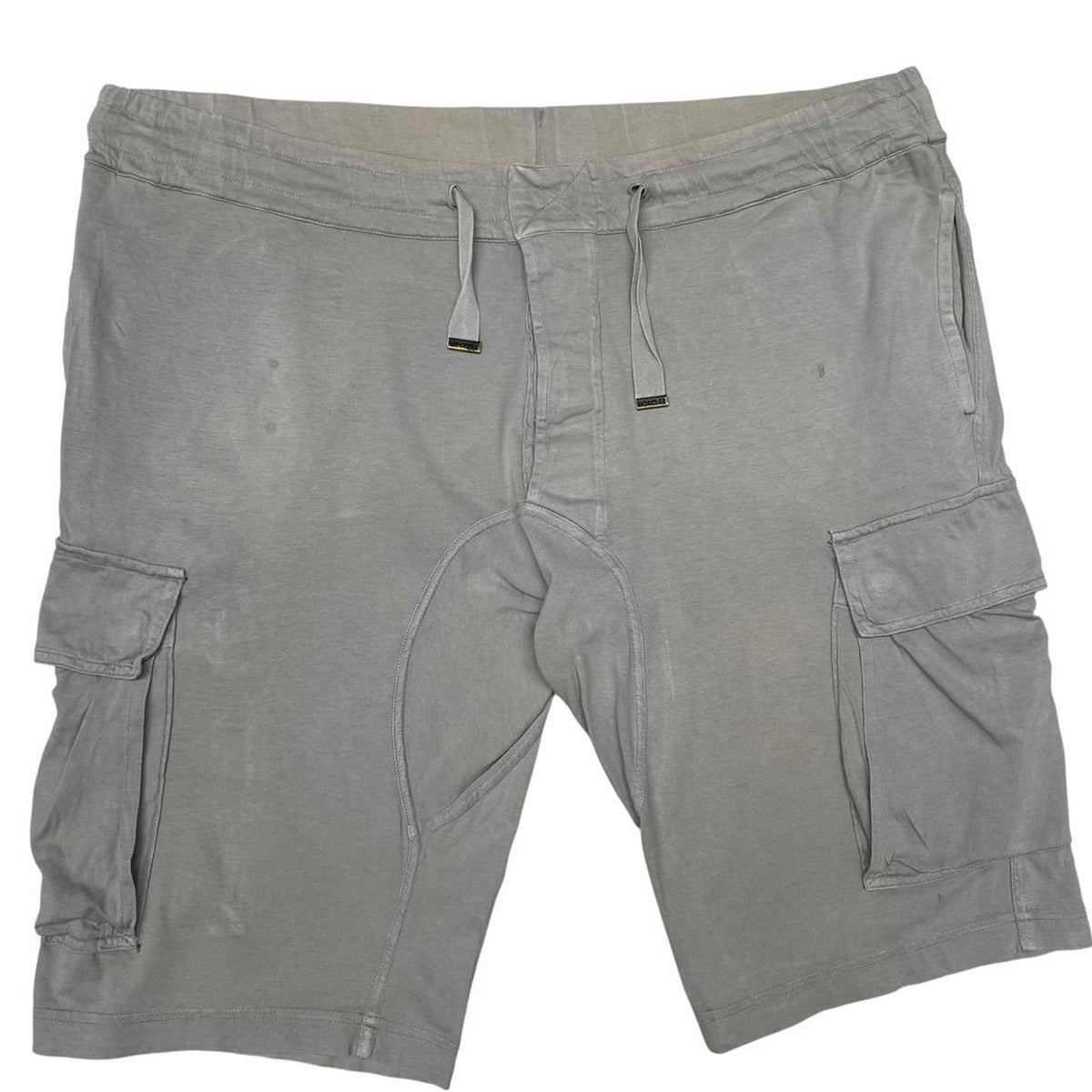 Moncler grey jogger shorts cotton material with logo detail and minor marks.