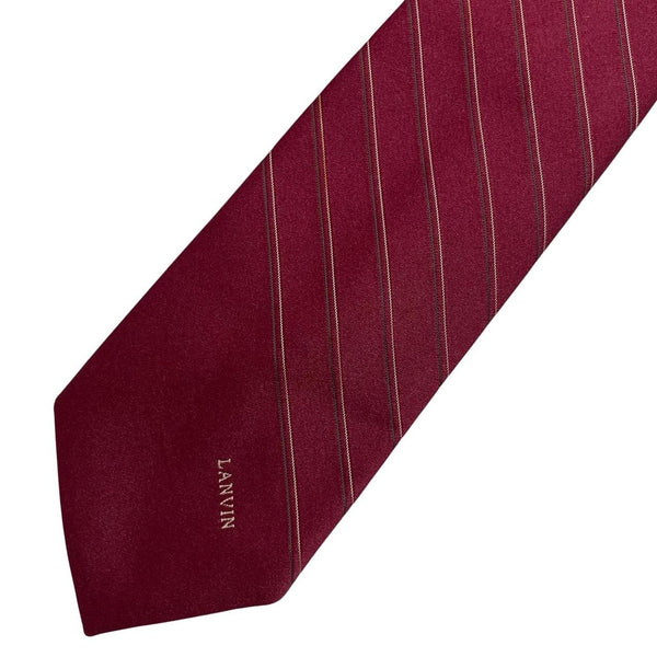 Lanvin burgundy silk tie with logo print and smooth texture.