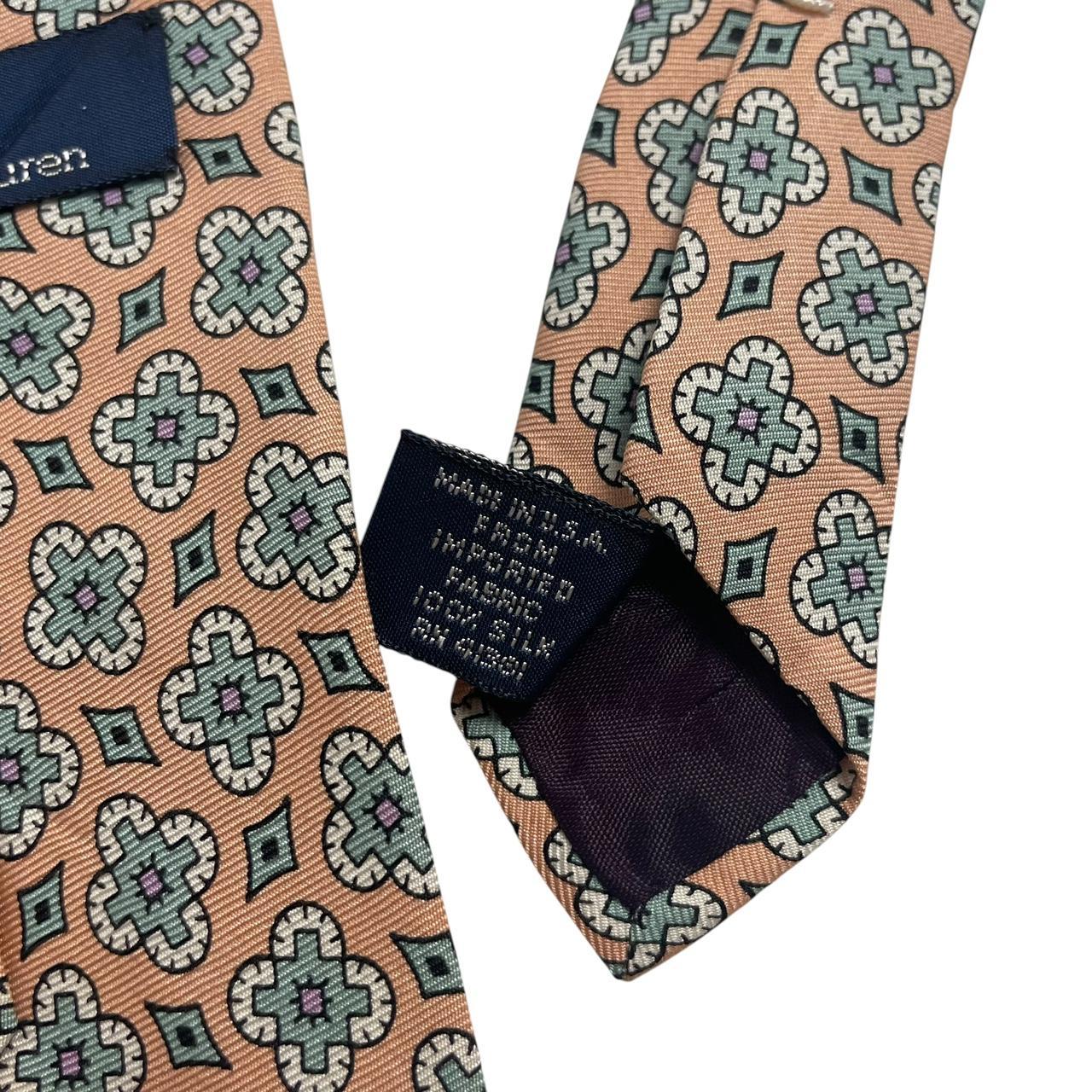 Polo Ralph Lauren multicoloured floral print silk tie with vibrant patterns and smooth texture.