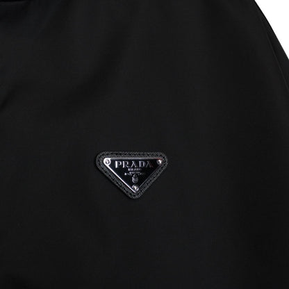 Prada black hooded jacket with full zip, Re-Nylon material, logo detail on sleeve.