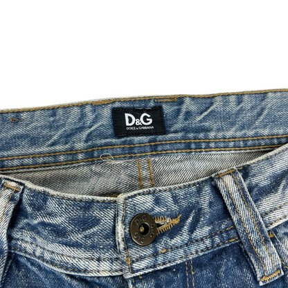 Dolce & Gabbana blue straight jeans mid wash with logo patch and slim fit design.