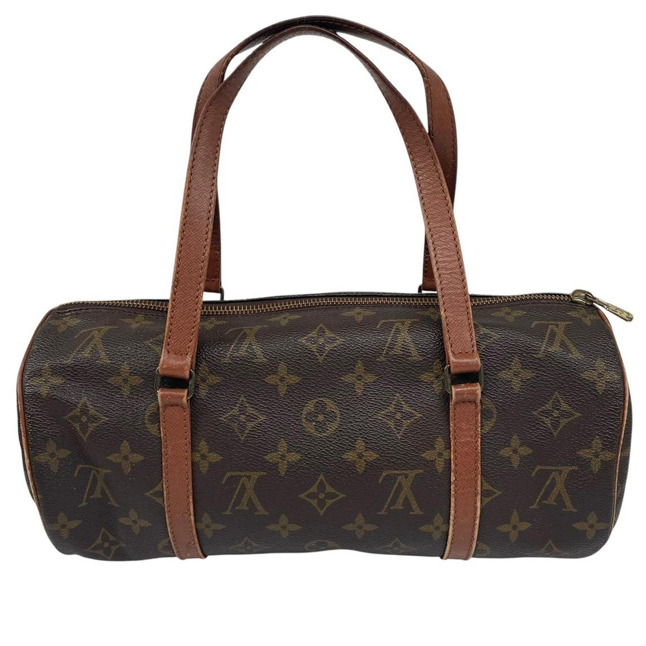Louis Vuitton duffel bag brown and tan monogram canvas with logo pattern and wear.