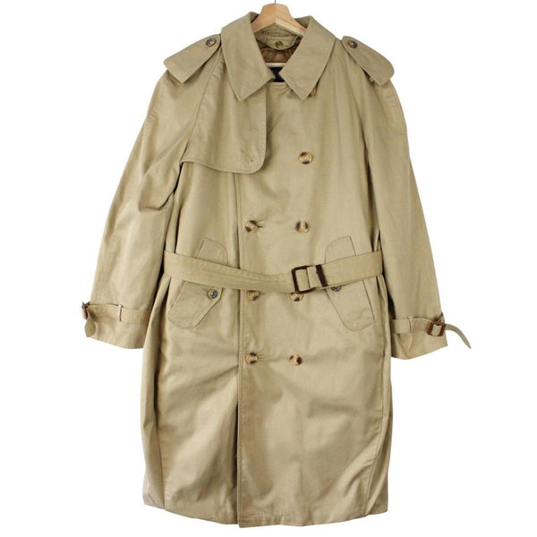 Burberry beige trench coat with Nova Check pattern, double breasted and belted design.
