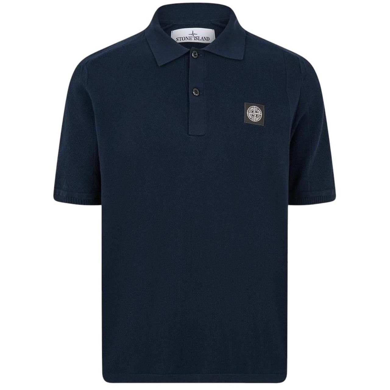 Stone Island navy blue polo shirt with Compass patch and three-button placket.