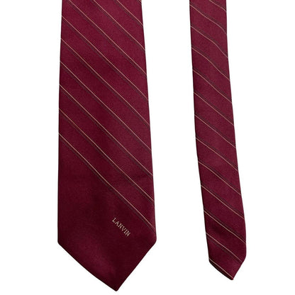 Lanvin burgundy silk tie with logo print and smooth texture.