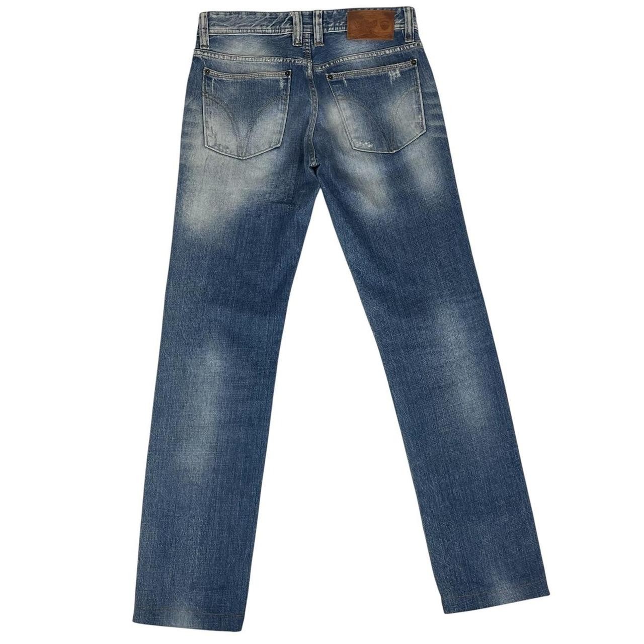 Dolce & Gabbana blue straight jeans mid wash with logo patch and slim fit design.