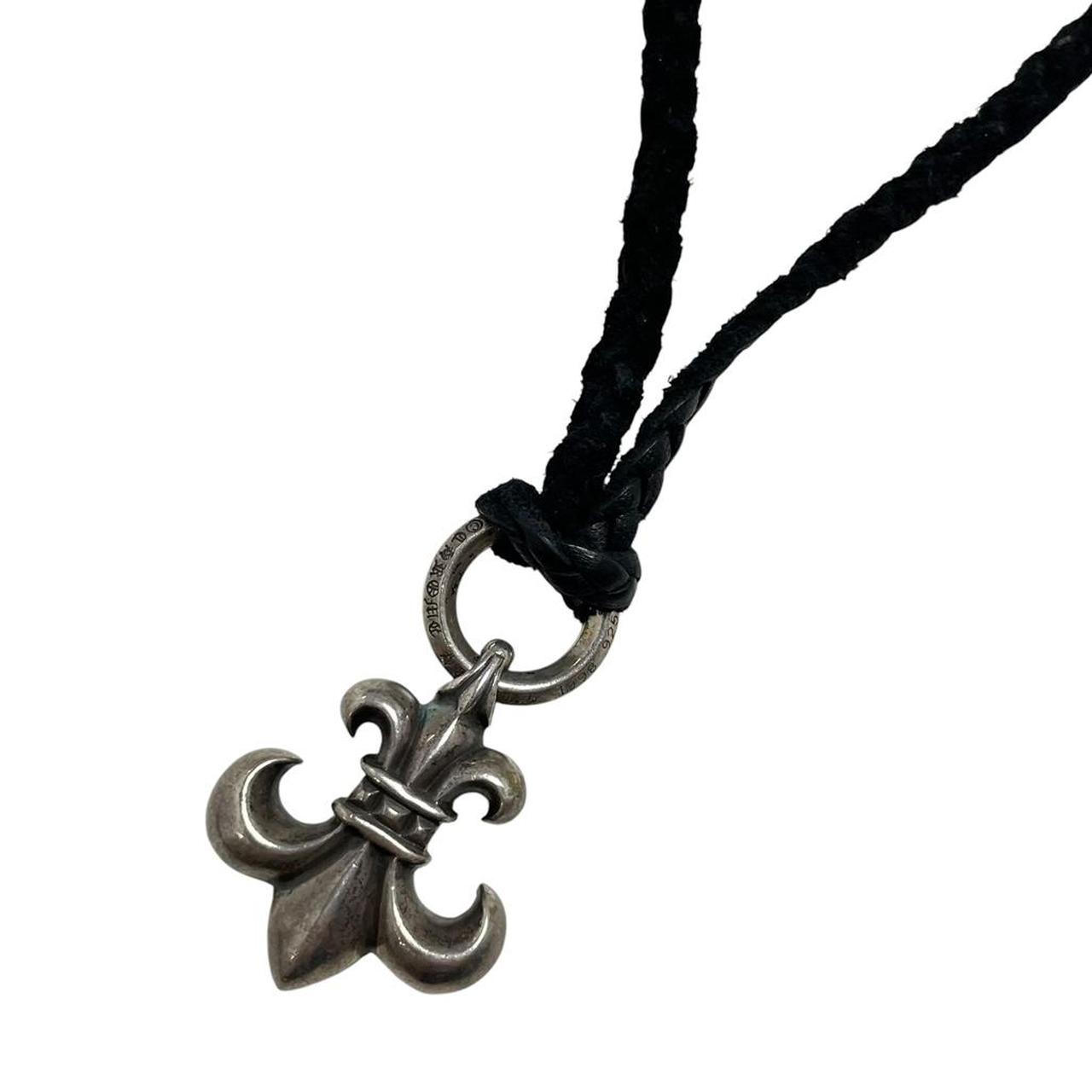Chrome Hearts silver fleur de lis pendant with leather cord, vintage 1998 design.