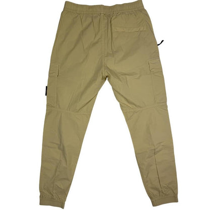 Stone Island beige cargo trousers with logo patch and stretch cotton material.