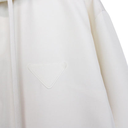 Prada cream silk hooded jacket with triangle logo and full zip detail.