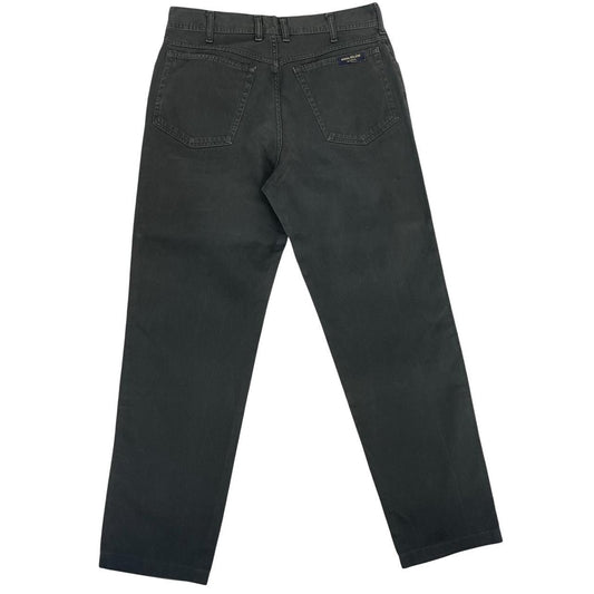 Stone Island green corduroy trousers with branded back pocket tab and regular fit.