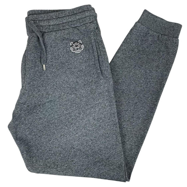 Kenzo grey joggers featuring embroidered tiger logo and soft cotton material.
