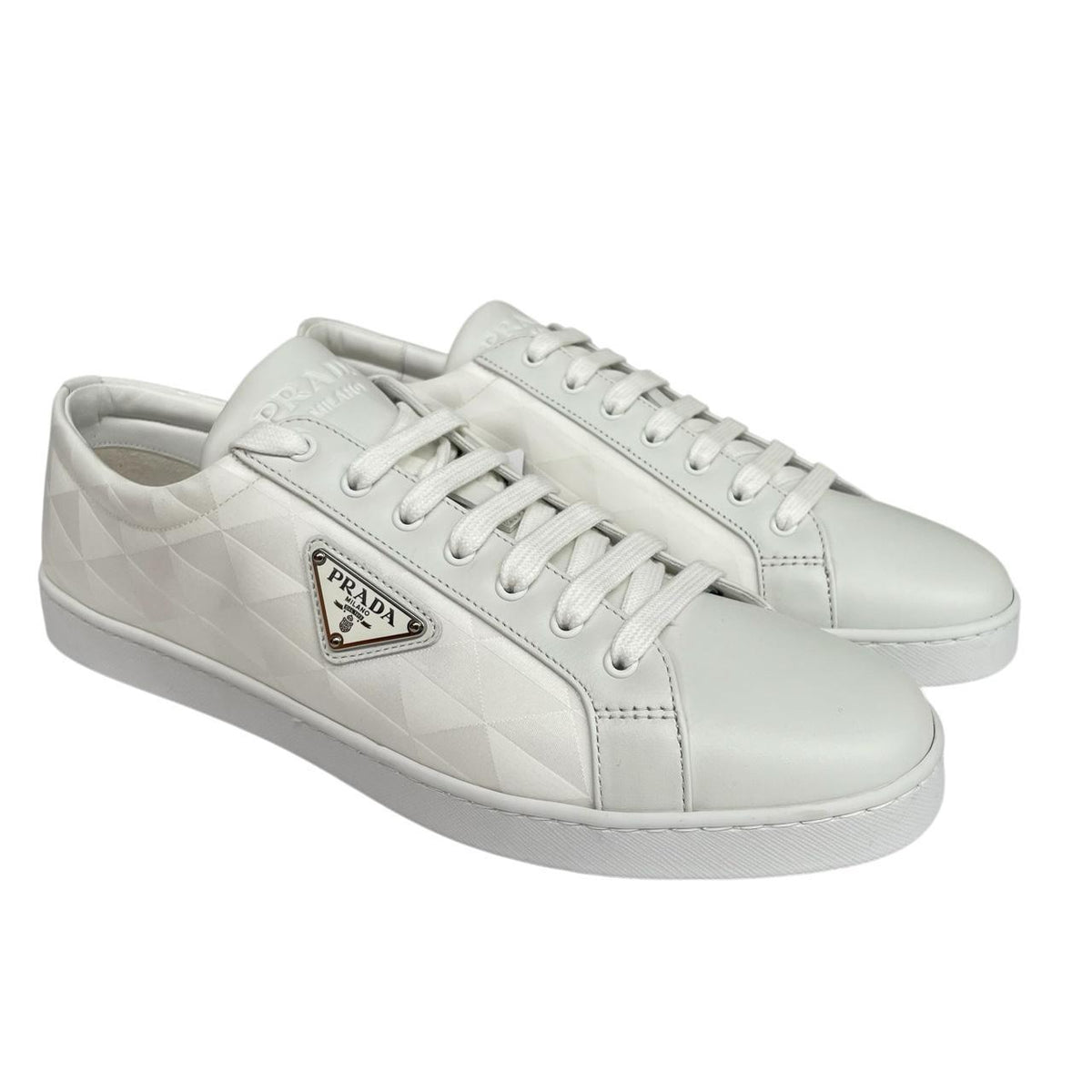 Prada white trainers Re-Nylon and brushed leather with logo detail and dust bags.