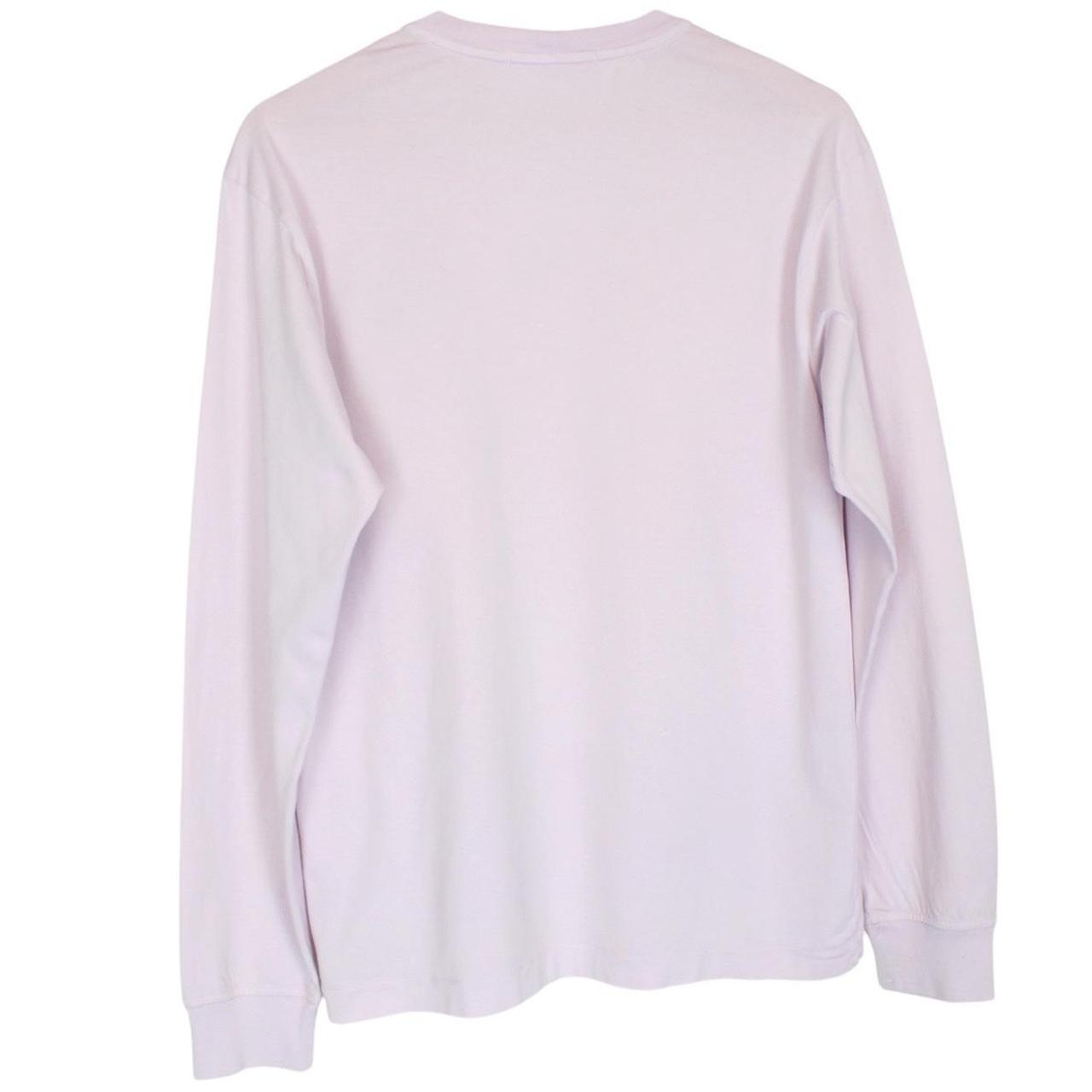 Stone Island pink long sleeve t-shirt with compass logo and pocket detail.