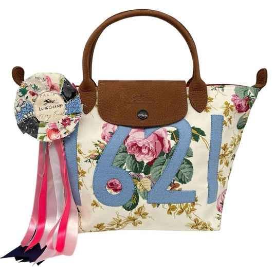 Longchamp multi tote bag featuring Tracey Emin artwork and iconic foldable design.