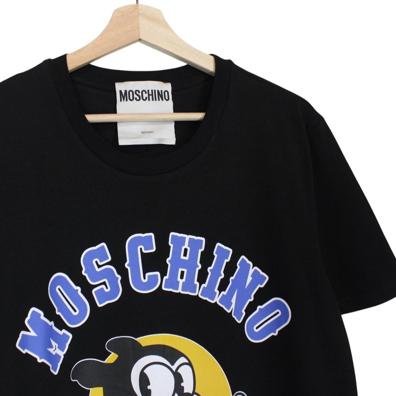 Moschino black cotton t-shirt featuring colorful cartoon print and logo detail.