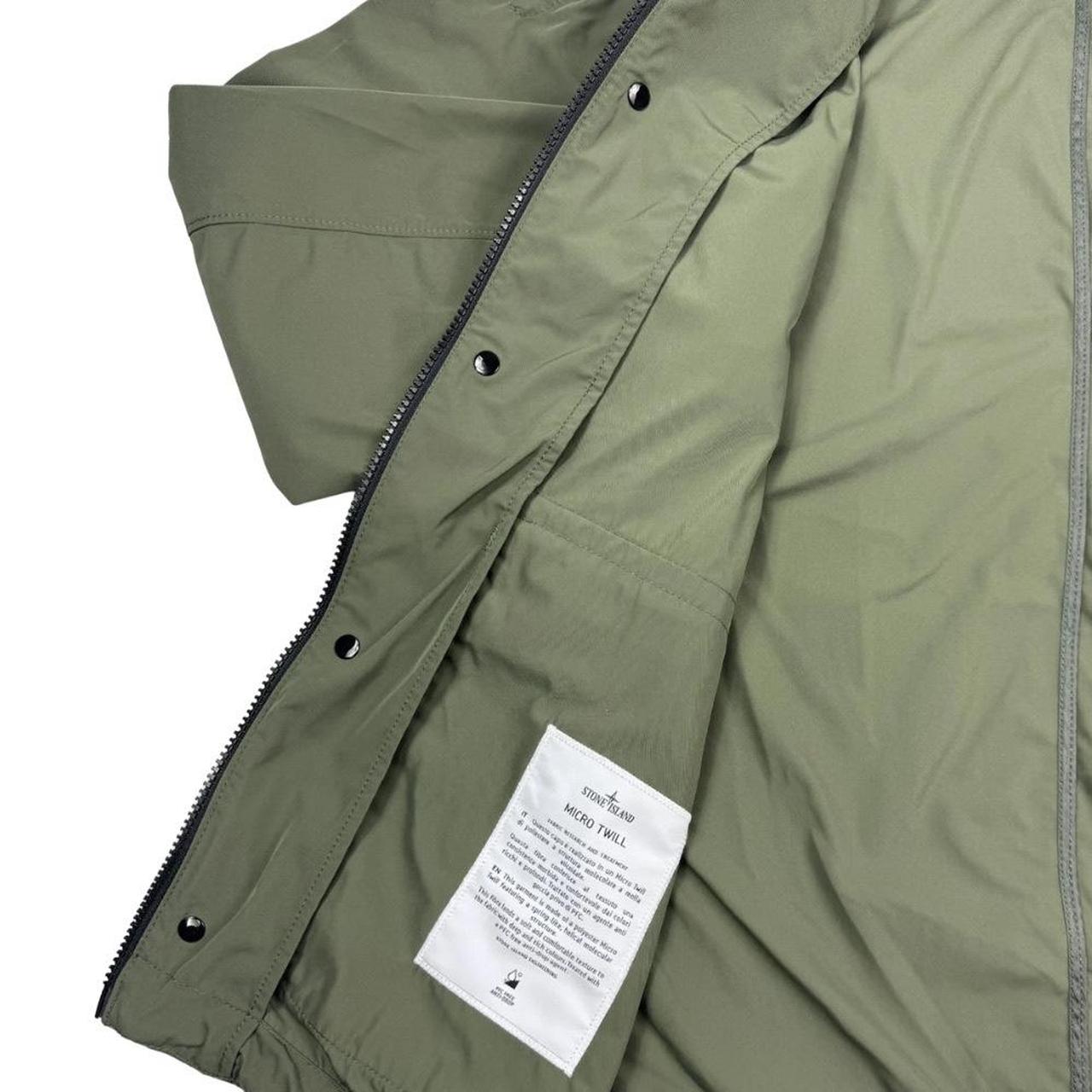 Stone Island green full zip micro twill jacket with removable woven brand patch.