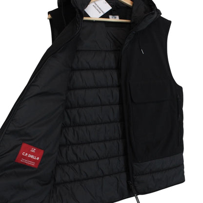 CP Company black goggle gilet with logo detail and shell material.