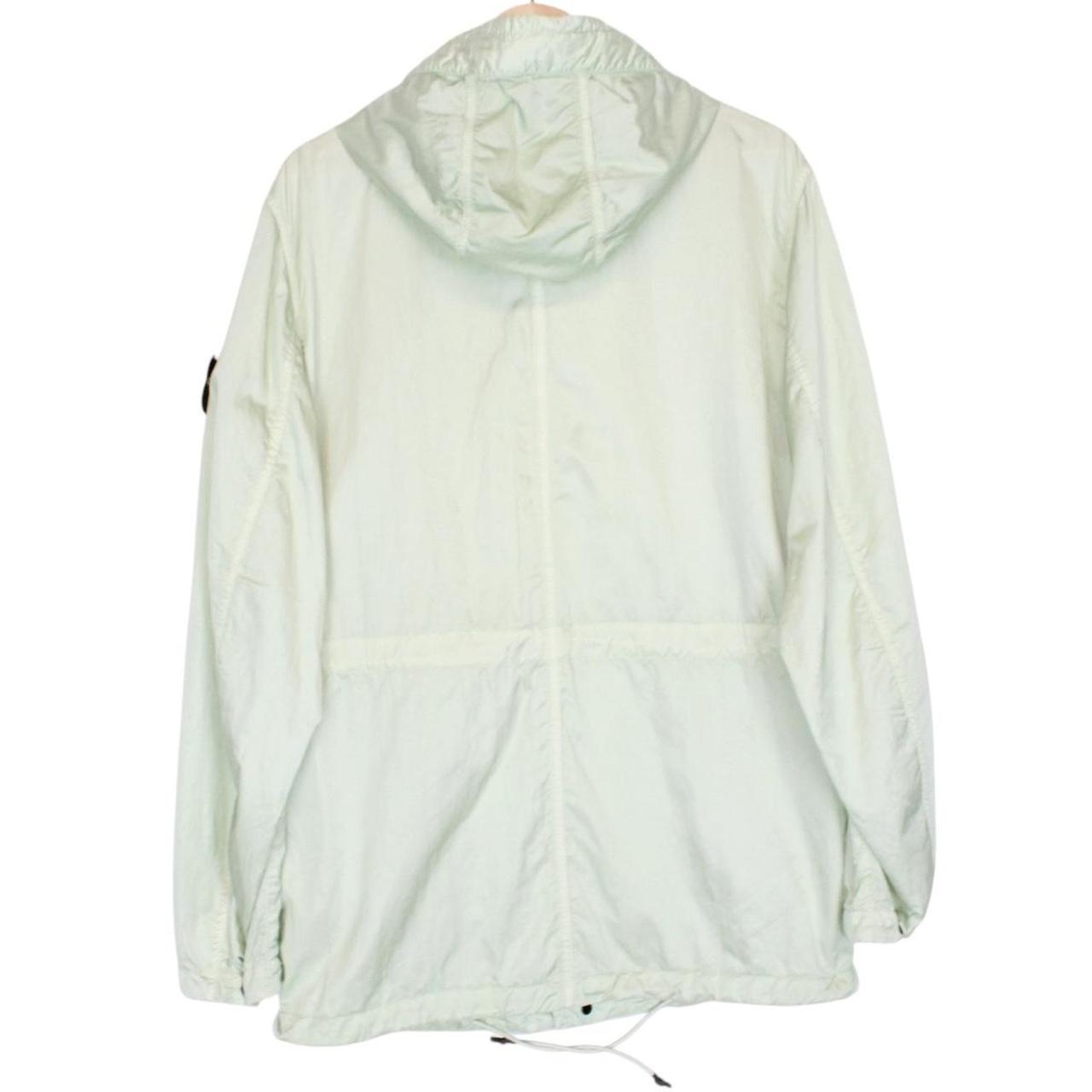Stone Island mint green multi pocket jacket with logo patch and nylon material.