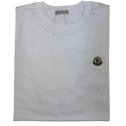 Moncler pocket t-shirts in black, grey, and white with patch logo details.