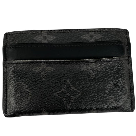 Louis Vuitton black and grey coated canvas double card holder with monogram pattern.