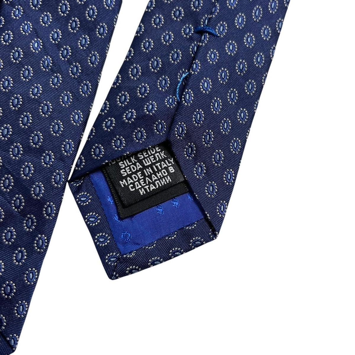 Hugo Boss blue silk tie with smooth texture and subtle sheen.
