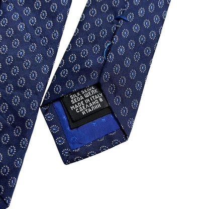 Hugo Boss blue silk tie with smooth texture and subtle sheen.