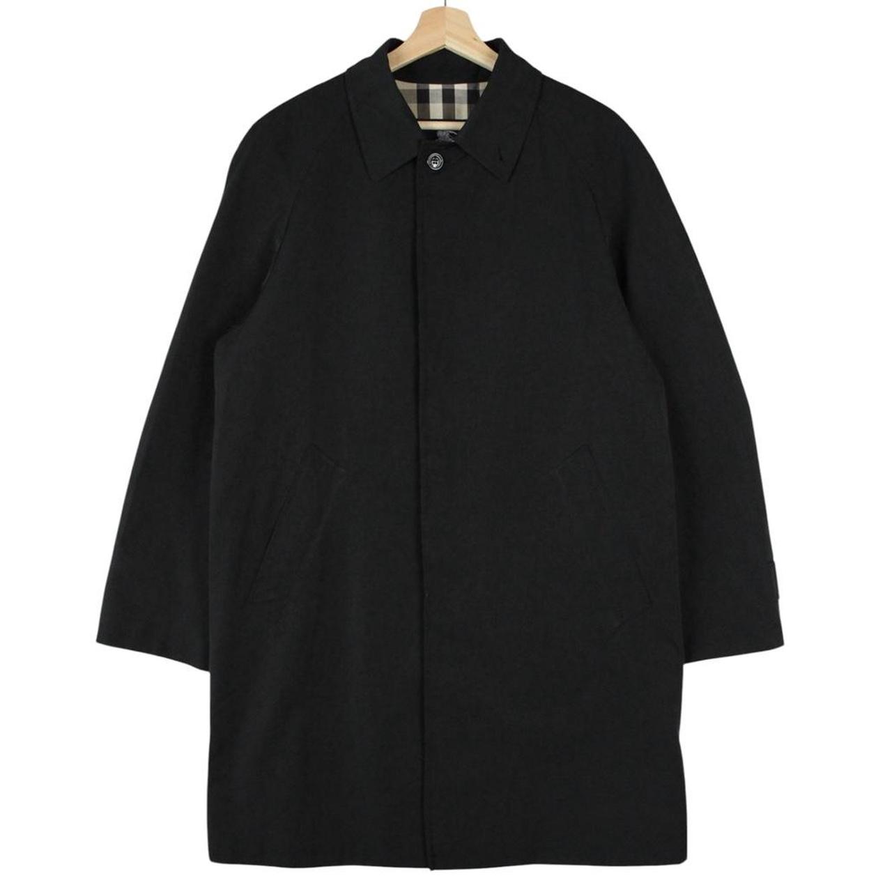 Burberry black Balmacaan coat with Nova Check lining and logo detail.